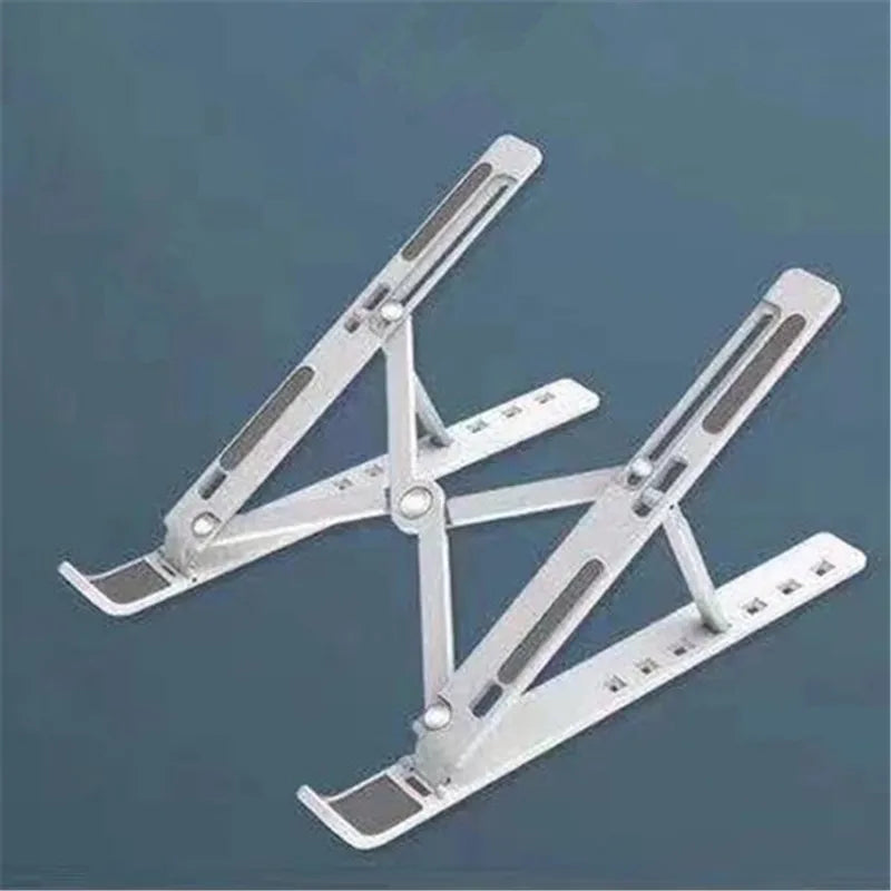 💻✨ Portable Foldable Laptop Stand – ABS Αναδιπλούμενη Βάση με Ρυθμιζόμενο Ύψος 🎯